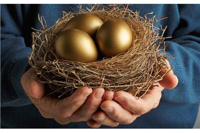 Golden nest egg held in two hands, representing a self-managed super fund